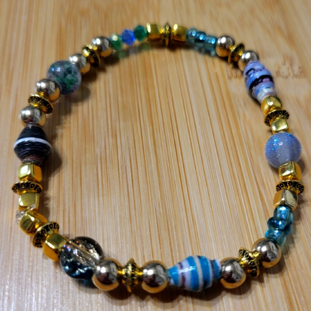 Home made bead bracelet. Gold , blue and Grey. 7in